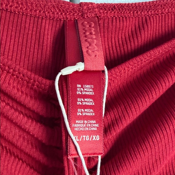 SKIMS Ribbed Drawstring Boot-Cut Pants in Deep Red - Picture 6 of 9